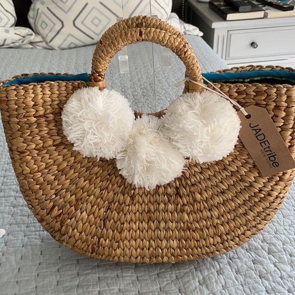 jadetribe Handbags - Straw summer Pom Pom bag